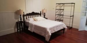 Casa Mayela Guest House客房内的一张或多张床位