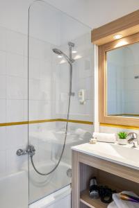 尼斯曼咖南爱达格公寓式酒店的一间浴室