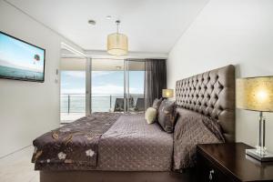 Sea Pearl A1 Beach Resort客房内的一张或多张床位