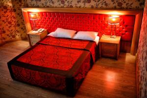 安塔基亚银莲花酒店客房内的一张或多张床位