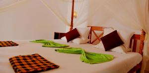 Nature Lanka Ayurveda Resort - All Meals and Ayurveda Treatments with Yoga客房内的一张或多张床位