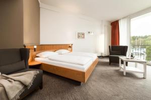 Hotel Spree-idyll客房内的一张或多张床位