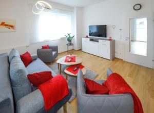 Ferienwohnung Narzisse - City Appartement im Kurpark Bad Aussee的休息区