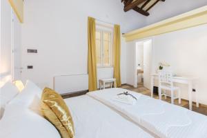 Residenza le Scalette客房内的一张或多张床位