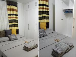 San Nicolasat the ALs Place的卧室两张照片,配有两张床