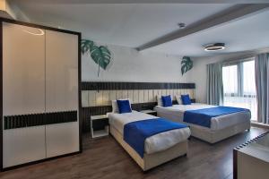 Kavala Hotel客房内的一张或多张床位