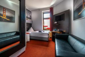 SL斯达斯酒店客房内的一张或多张床位