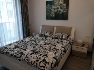 Holiday Apartment Mamaia Nord客房内的一张或多张床位