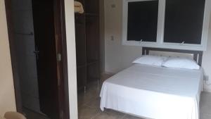 Hotel Maringa客房内的一张或多张床位