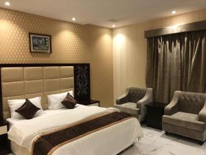 Abraj Al Taif Furnished Units 2客房内的一张或多张床位