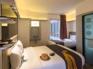 内罗毕西兰宜必思风格酒店客房内的一张或多张床位