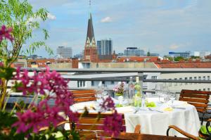 柏林多米希尔金色郁金香酒店餐厅或其他用餐的地方