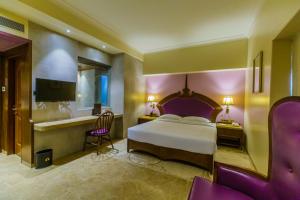 Hotel Sai Palace , Mangalore客房内的一张或多张床位