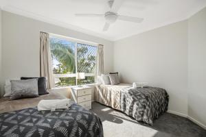 基拉棕榈假日公寓客房内的一张或多张床位
