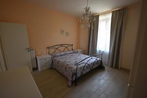 LA CASA DI CHIANNI La Pieve客房内的一张或多张床位