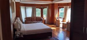 Kisa Villa客房内的一张或多张床位