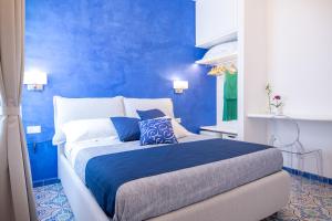 Valle d'Amalfi Suites客房内的一张或多张床位