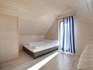 Morskie domki Mielno客房内的一张或多张床位