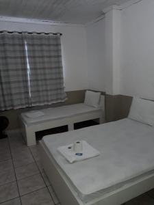 Hotel Aruba客房内的一张或多张床位