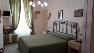 Hotel La Barcarola客房内的一张或多张床位