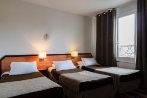 The Originals City, Hôtel Astoria Vatican, Lourdes (Inter-Hotel)客房内的一张或多张床位