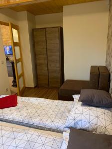 Kenese Panoráma Apartman 2客房内的一张或多张床位