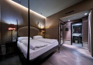 帕拉索巴巴里戈苏卡那格兰德酒店客房内的一张或多张床位