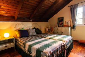 Chalet Pico das Pedras客房内的一张或多张床位