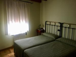 Hospedaje Casa Amalia客房内的一张或多张床位