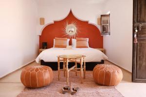 极乐鸟摩洛哥传统庭院住宅客房内的一张或多张床位
