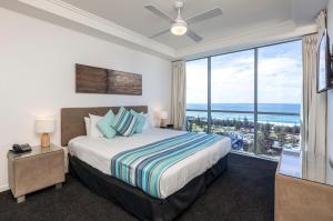 Ocean Pacific Resort - Official客房内的一张或多张床位