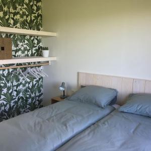 Bungalow Groen客房内的一张或多张床位