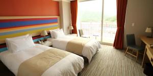 Inje Speedium Hotel & Resort客房内的一张或多张床位