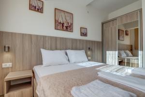 Adriatik Lux Apartments客房内的一张或多张床位