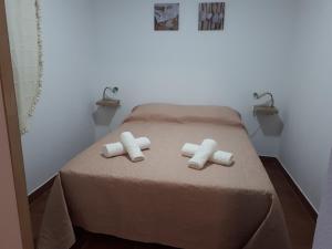 Venâncio Alojamento客房内的一张或多张床位