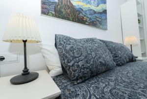 Wonderful Malagueta Pompidou客房内的一张或多张床位