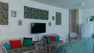 Apartment in a tropical Paradise in Sosua的休息区