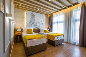 HillHouse Plovdiv客房内的一张或多张床位