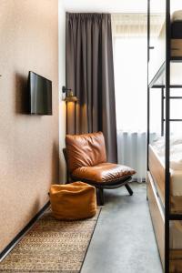 GuestHouse Hotel Kaatsheuvel-Waalwijk的休息区