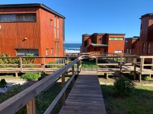 皮奇勒姆Casa con acceso directo a playa en condominio的相册照片