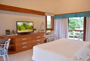 Bella Ilha Pousada客房内的一张或多张床位