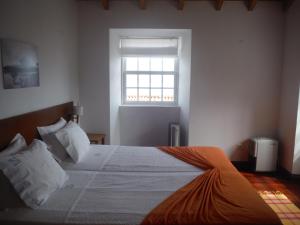 Quinta Da Ribeira Da Urze客房内的一张或多张床位