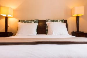 莱斯巴斯提阿布莱特高尔夫酒店客房内的一张或多张床位