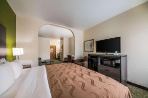 圣安东尼奥品质套房酒店客房内的一张或多张床位