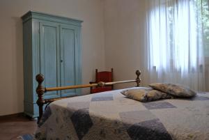 Lovely Tuscan Country House客房内的一张或多张床位