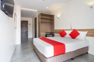 18 Suites Cebu客房内的一张或多张床位
