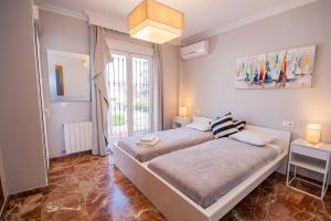 Cubo's Villa Yedra Guadalmar客房内的一张或多张床位