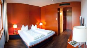 安斯费尔登罗森伯格门特酒店客房内的一张或多张床位