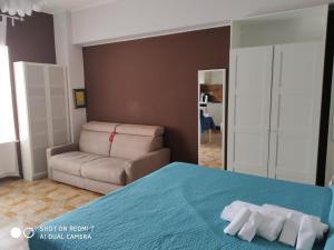 里昂纳尔多B&B住宅酒店客房内的一张或多张床位