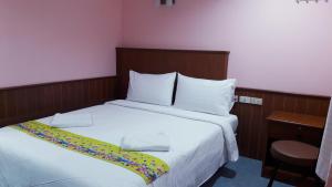 七岩海星旅馆客房内的一张或多张床位